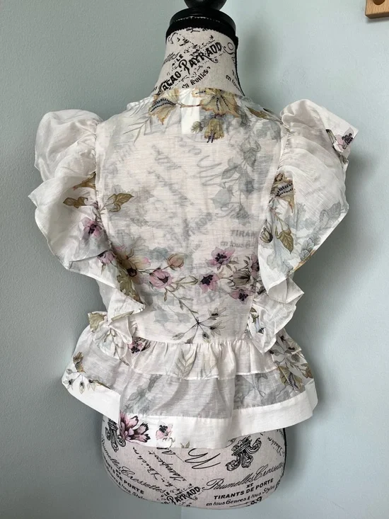 LINEN-BLEND PEPLUM TOP (worn only in a photo shoot). - Picture 7 of 16